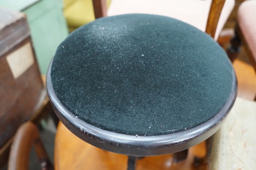 A Victorian rosewood footstool, width 32cm, height 36cm and a contemporary ebonised adjustable piano stool